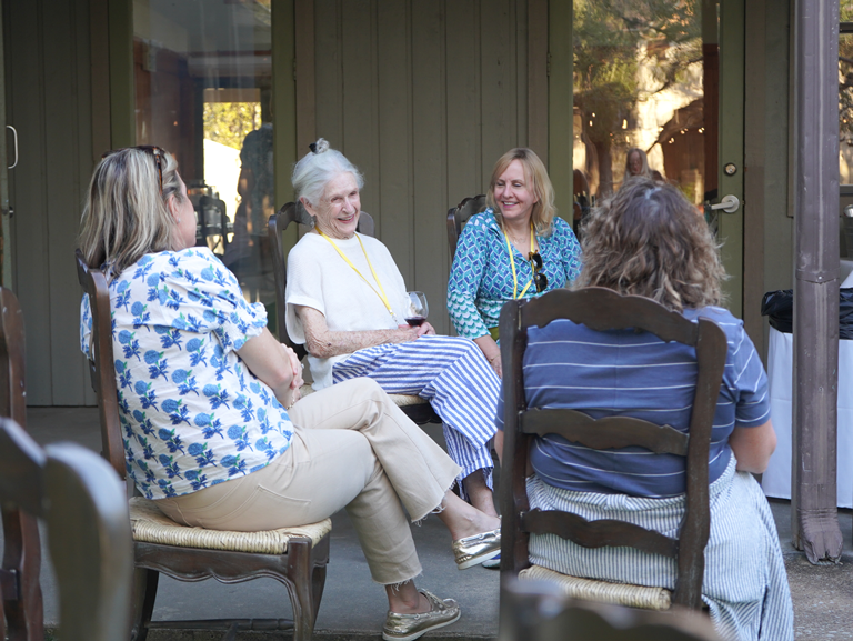 Women of Good Shepherd Episcopal Church gathering outdoors for retreat fellowship in Austin Texas