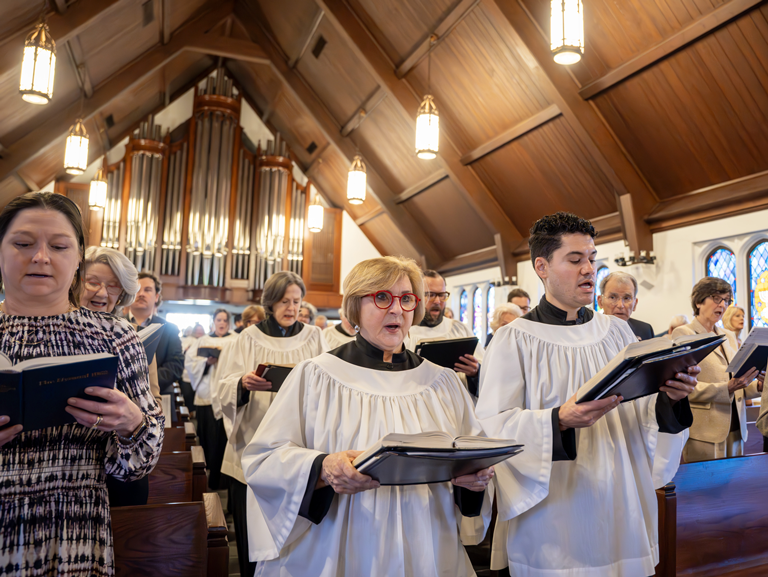 Choir members and congregation sing hymns during an Episcopal worship service at Good Shepherd Episcopal Church in Austin, Texas.